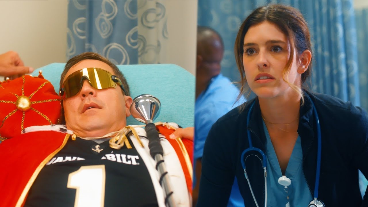 guy in a vanderbilt jersey laying in a hospital bed and his nurse