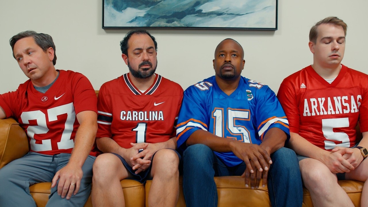 four guys in jerseys - Alabama, Carolina, Florida, Arkansas
