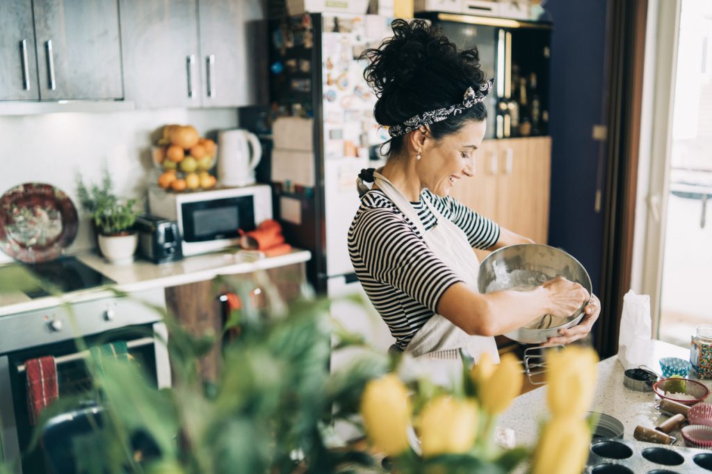 Lady in Kitchen Cooking