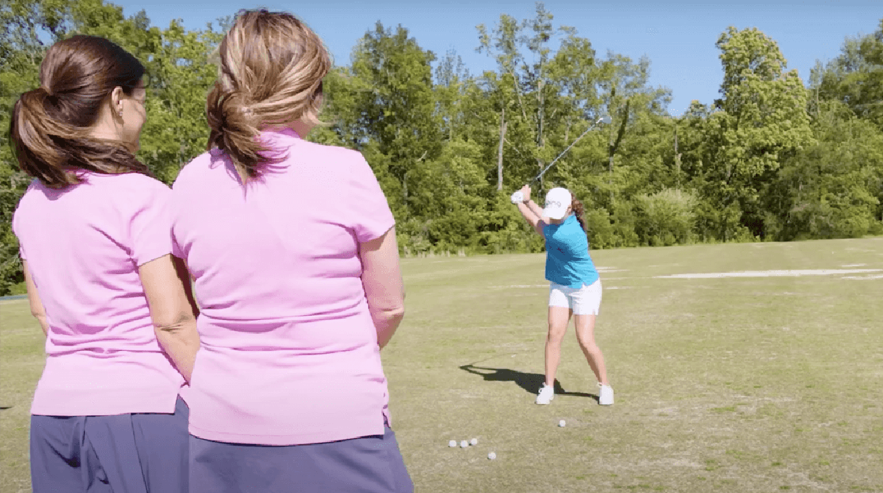 Hosts Sarah Stone Smith and Courtney Goolsby playing golf with Ally Ewing