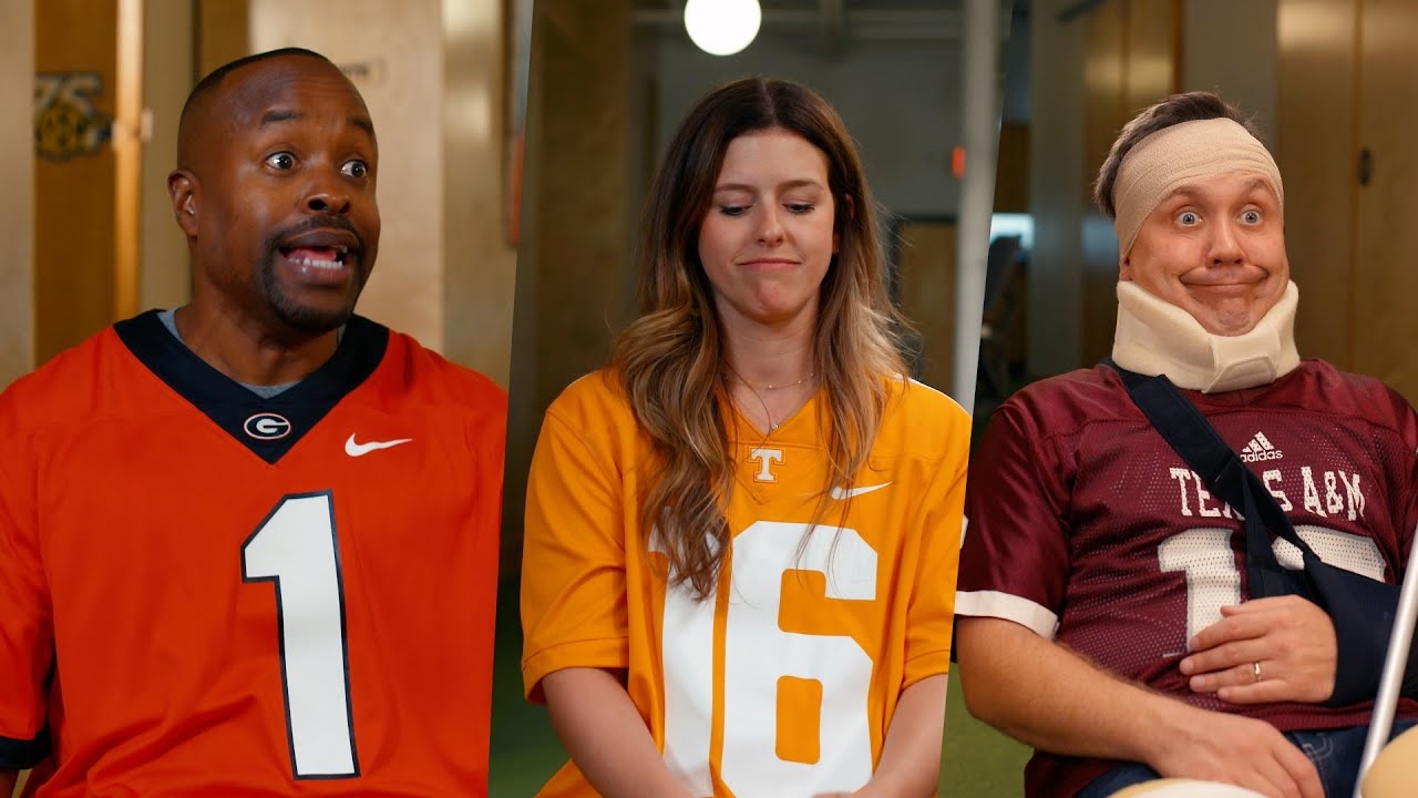 Guy in Georgia jersey, girl in Tennessee jersey, injured guy in Texas AM jersey